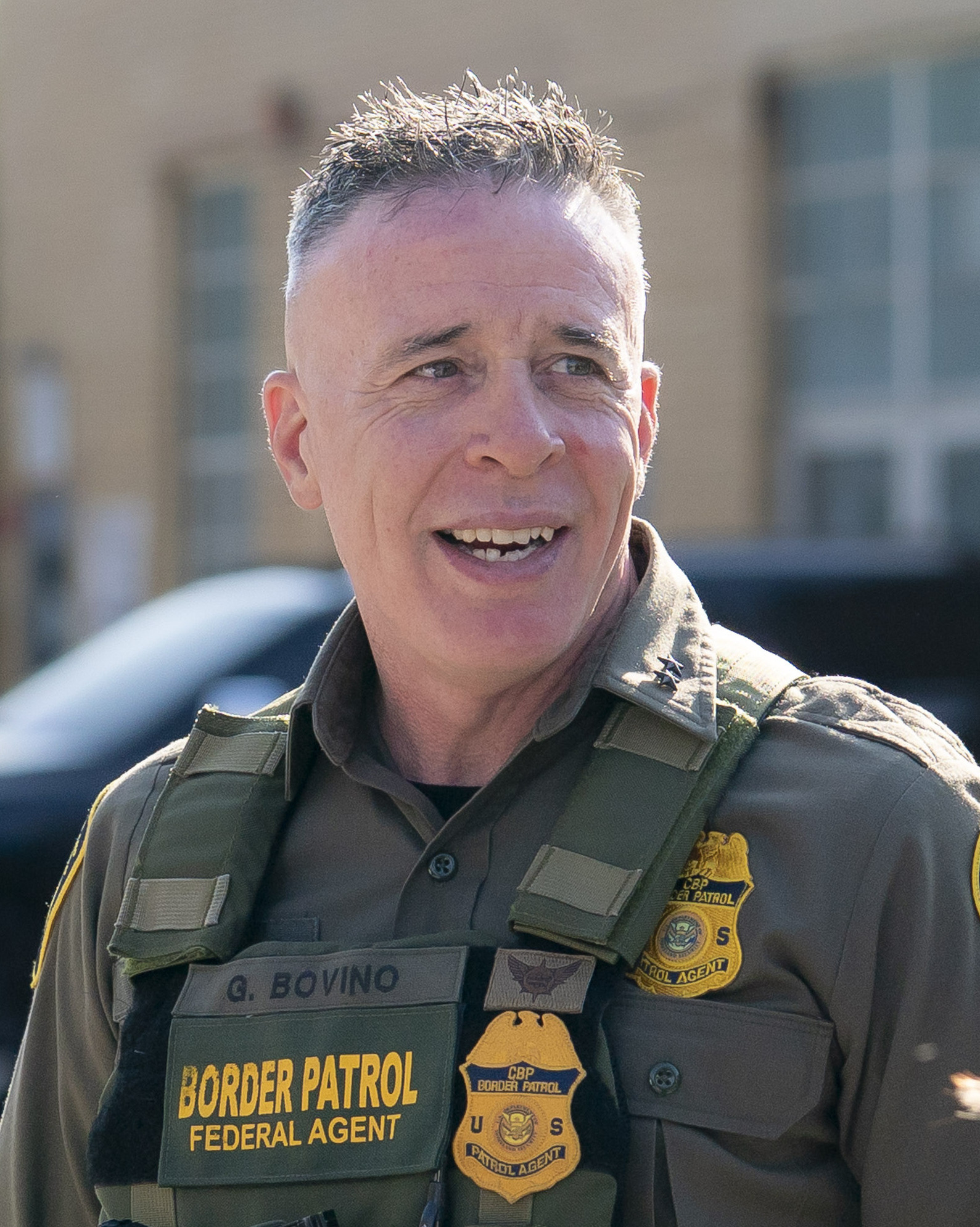 Gregory K. Bovino smiling during Chicago ICE operations